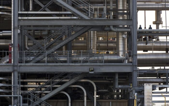 Detailed view of scaffolding and pipework at the BKV Temple 1 power plant